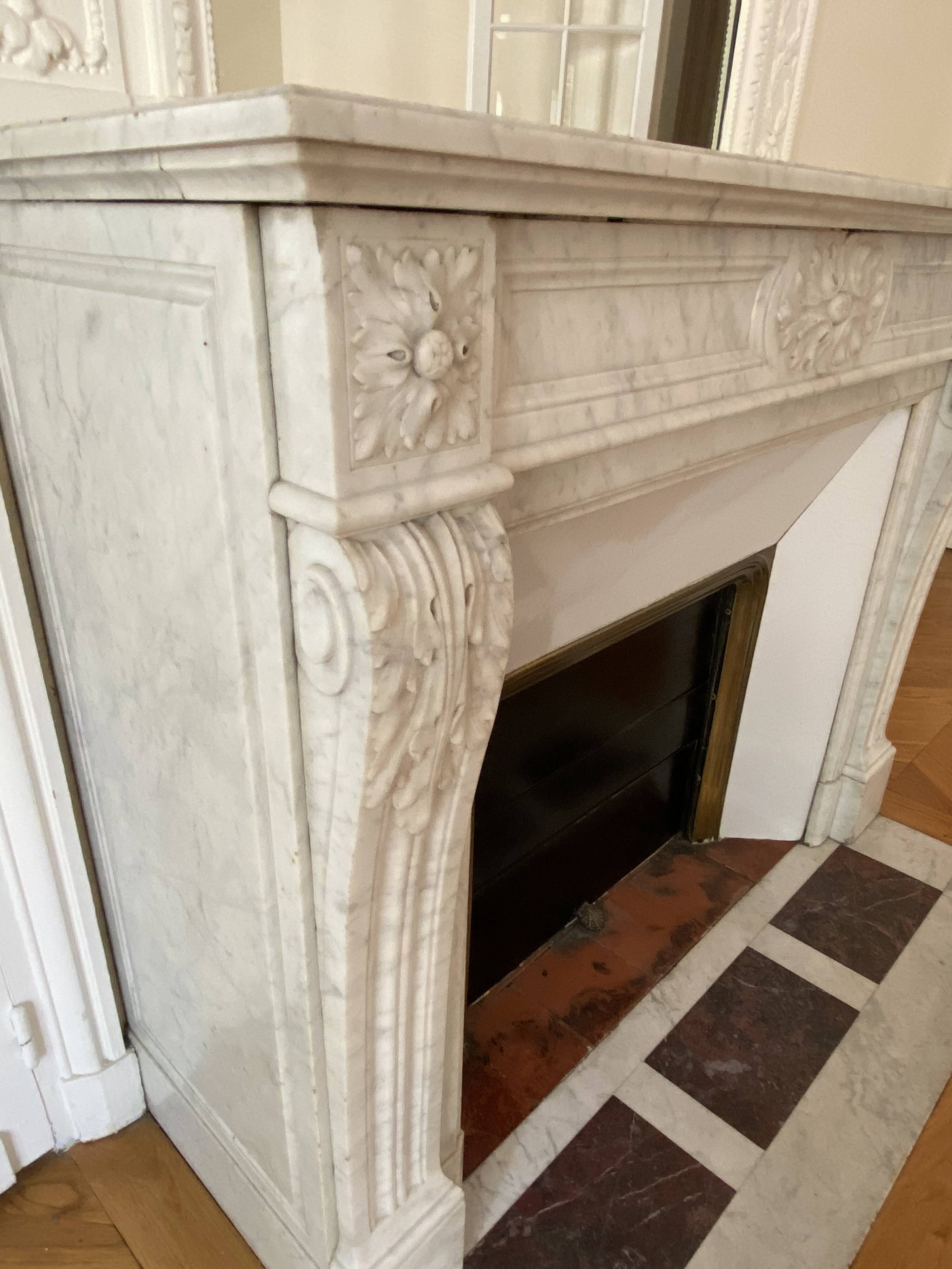 Antique marble fireplace with overmantel and mirror - Haussmannian apartment