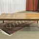 English coffee table in rosewood with tiled section from the 1970s.