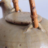 Sandstone teapot with rattan handle