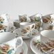 12 ironstone coffee cups with polychrome floral decoration, KG Lunéville