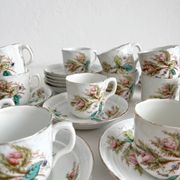 12 ironstone coffee cups with polychrome floral decoration, KG Lunéville