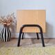 Bedside table - small wooden piece of furniture with a tubular metal base.