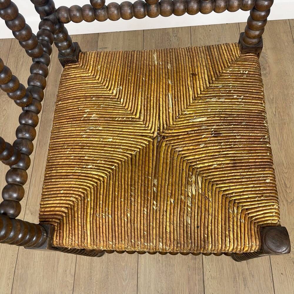 Old wooden ball fireside chair