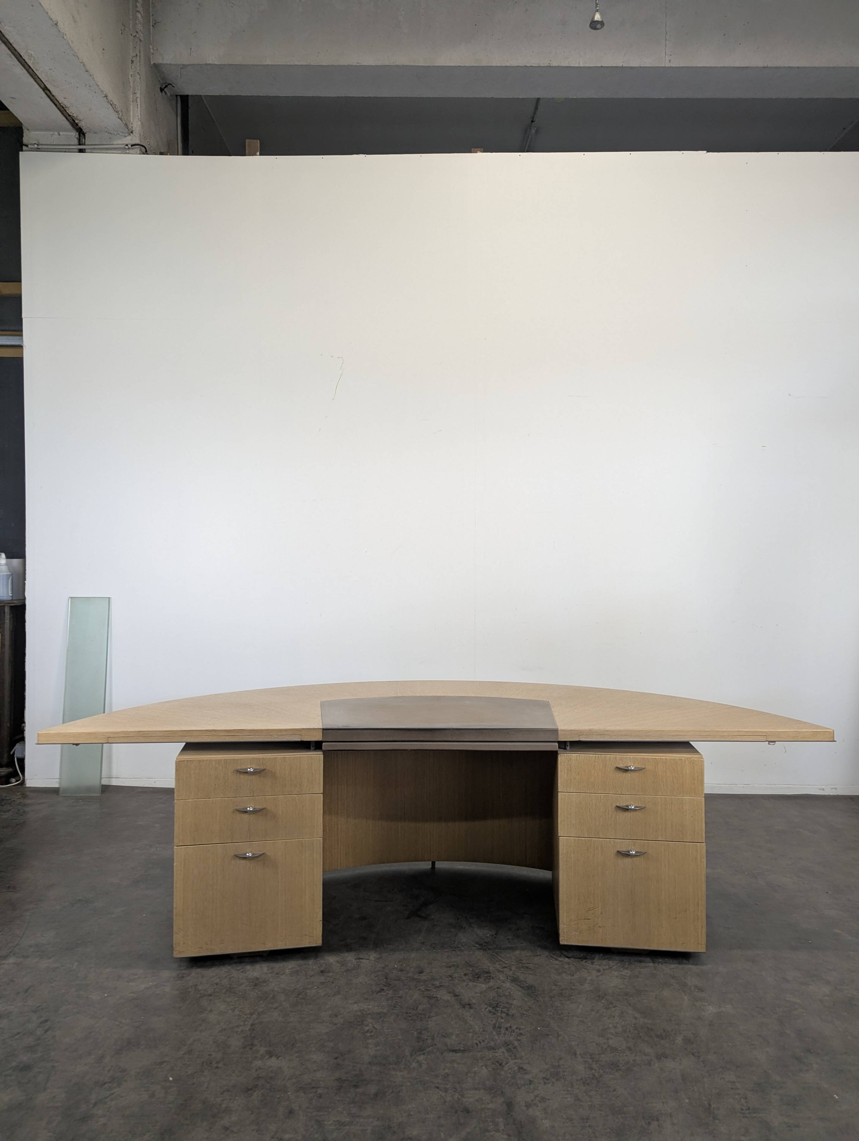 Large semicircular desk by André Putman published by Ecart International.