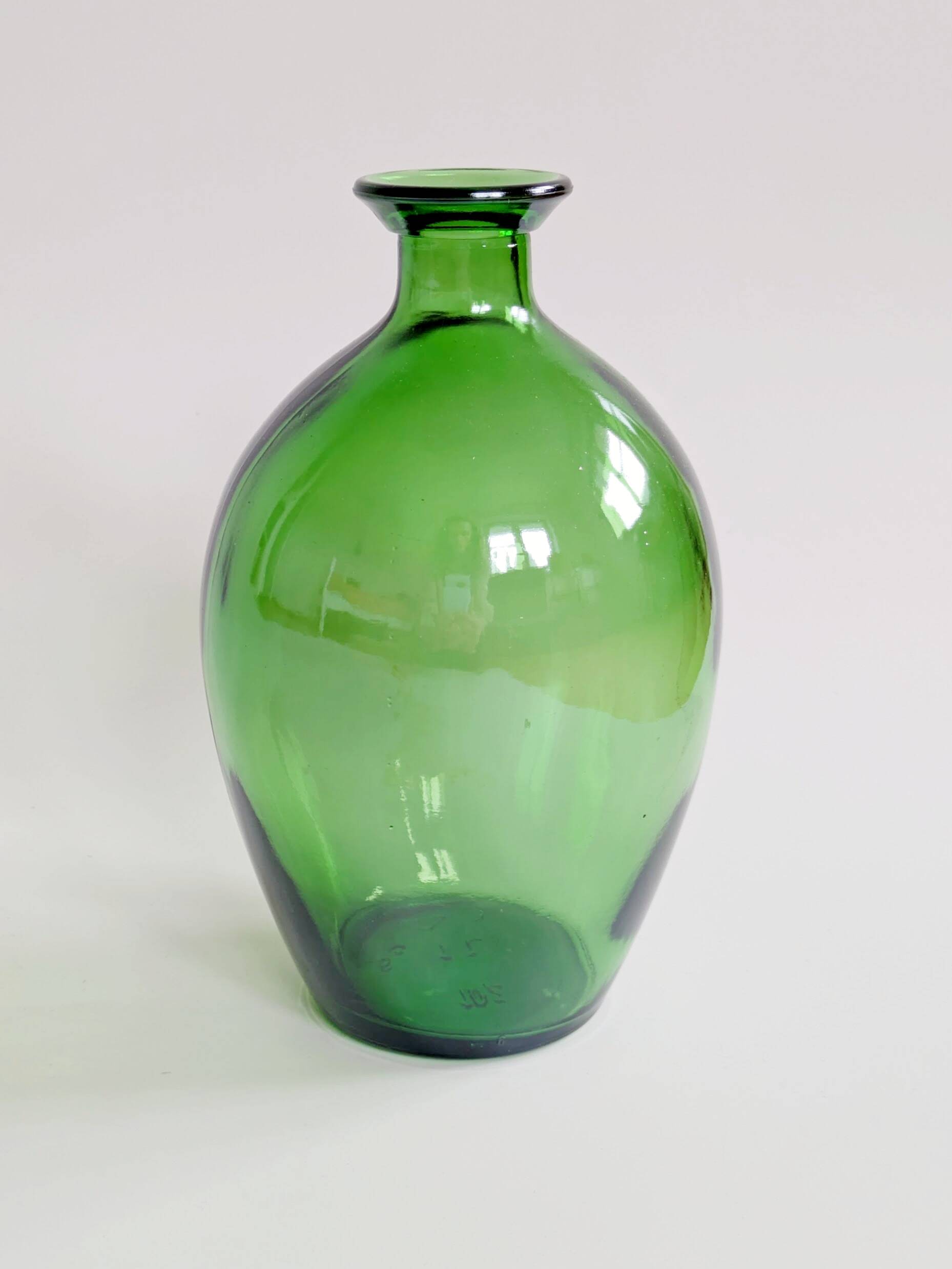 Vintage green glass bottle vase, decorative soliflore.