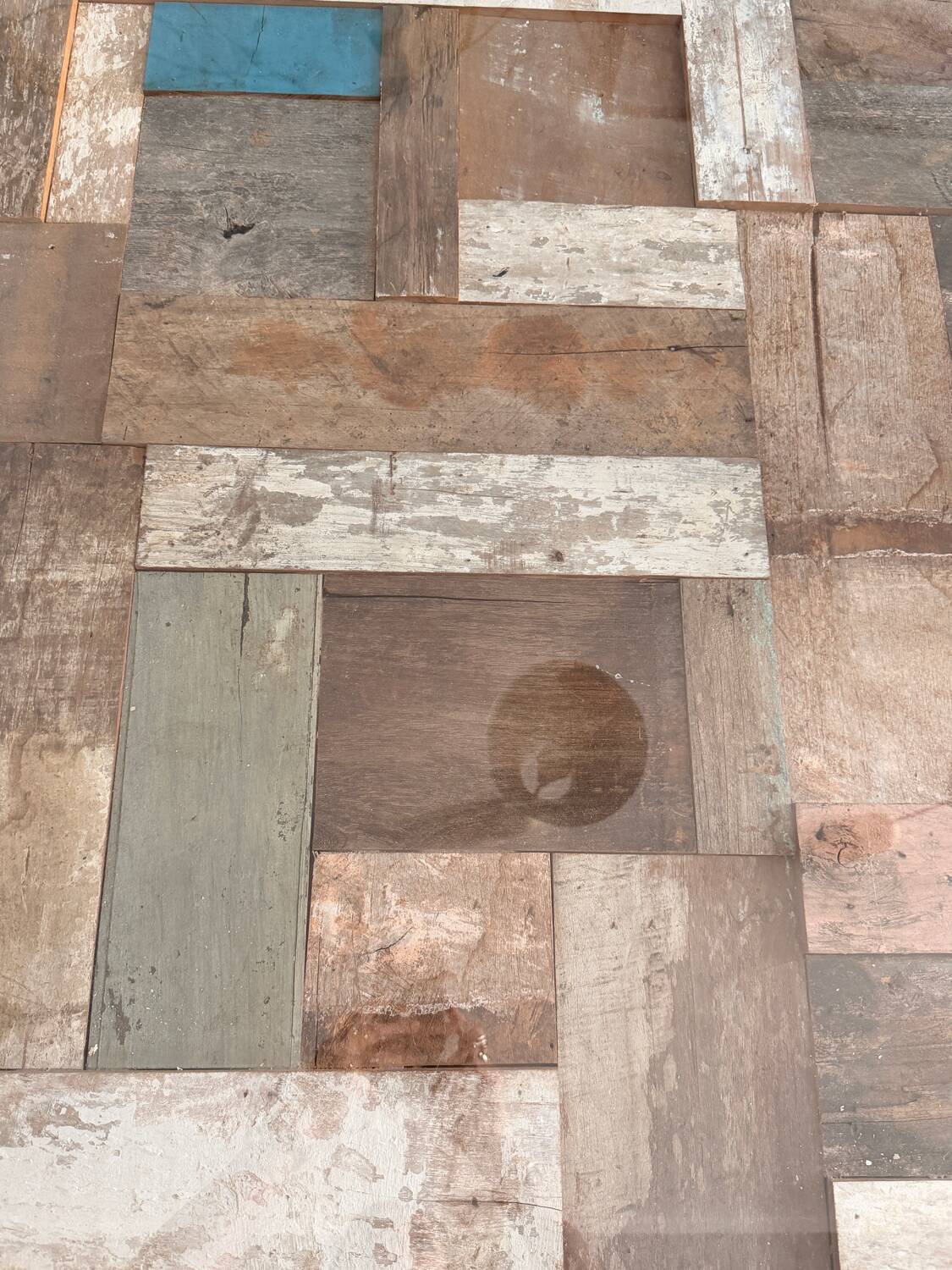 Magnificent wooden table with a glass top.