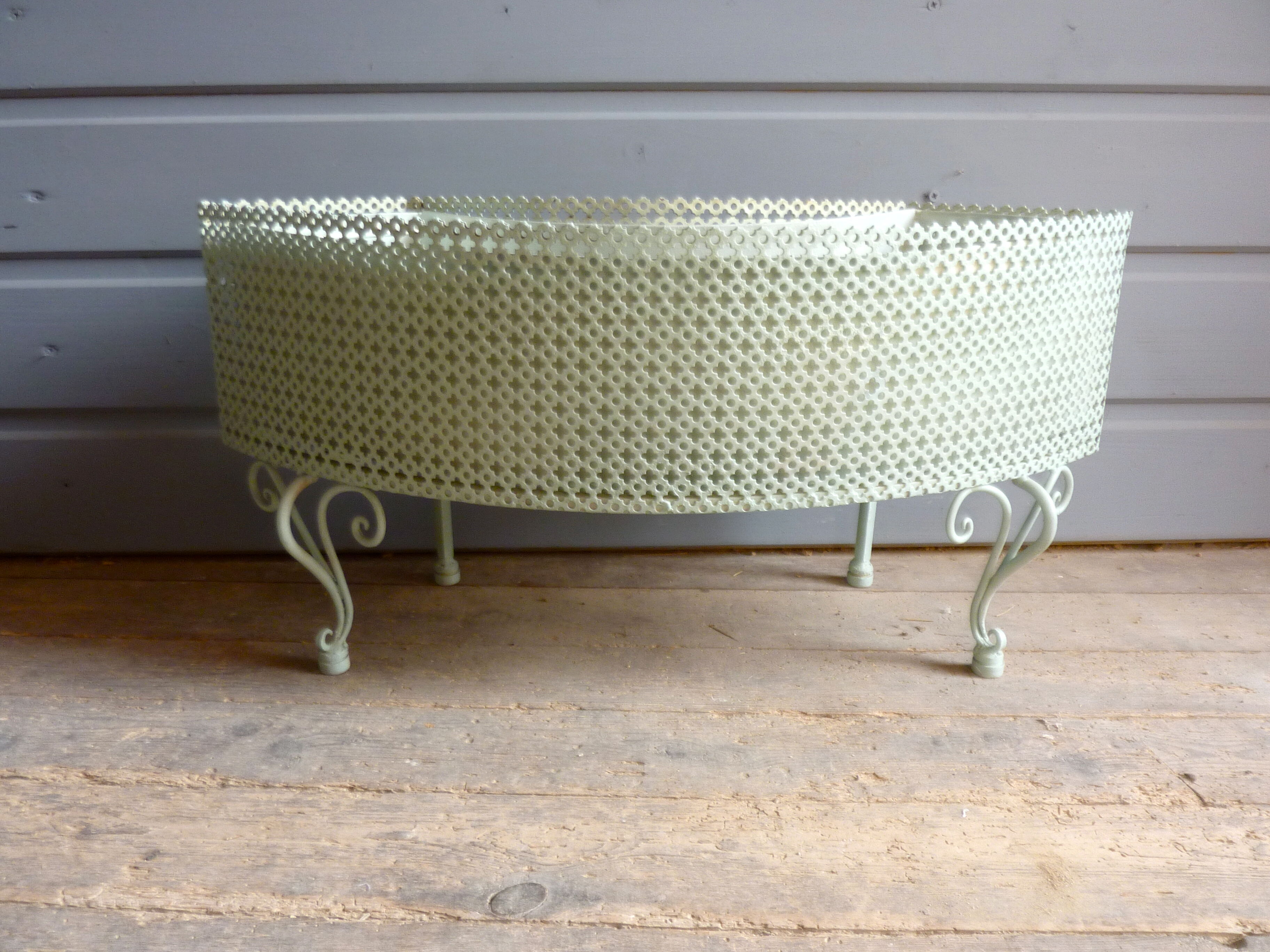 Perforated metal planter from the 1950s