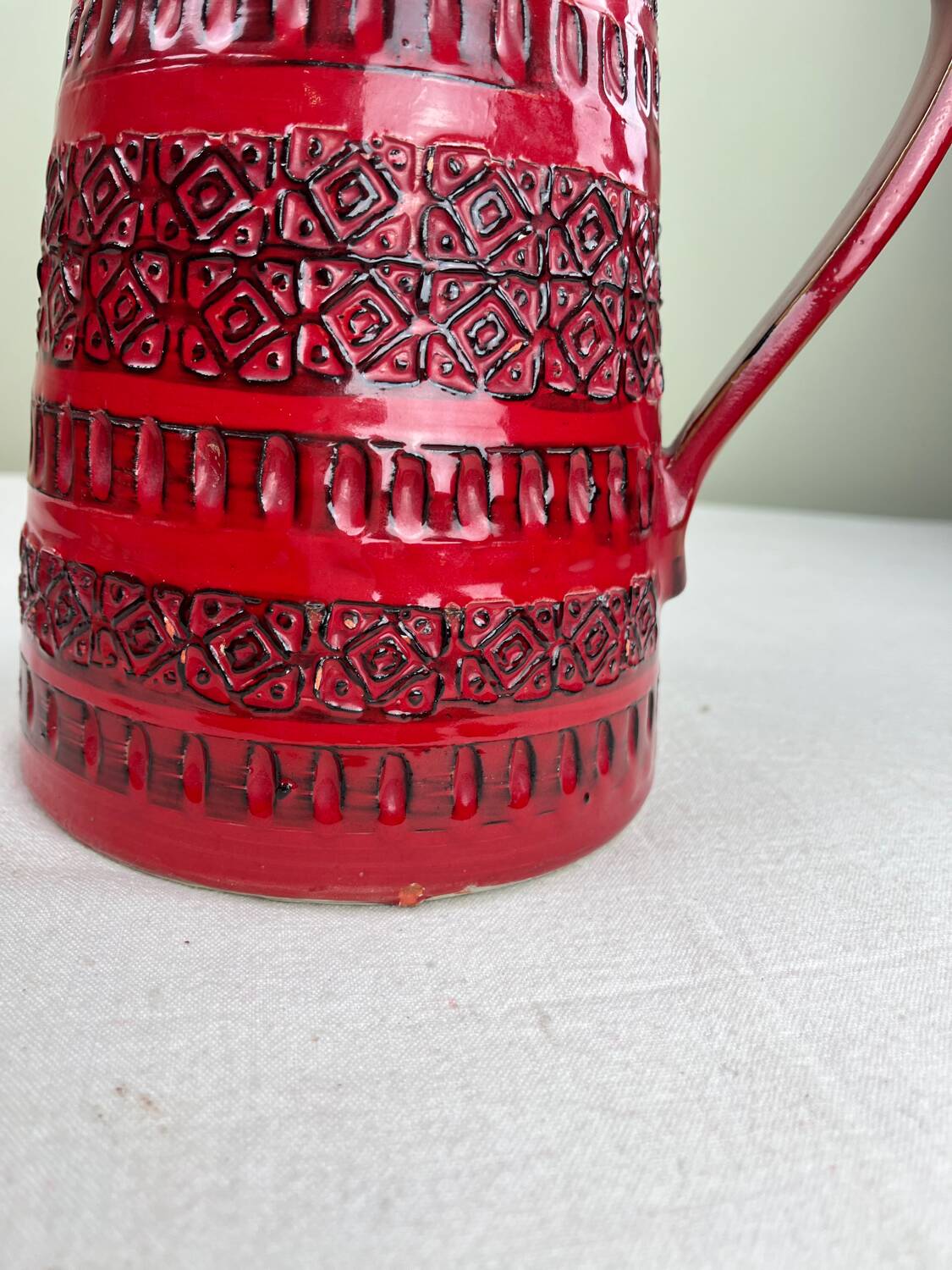 Vintage red ceramic jug