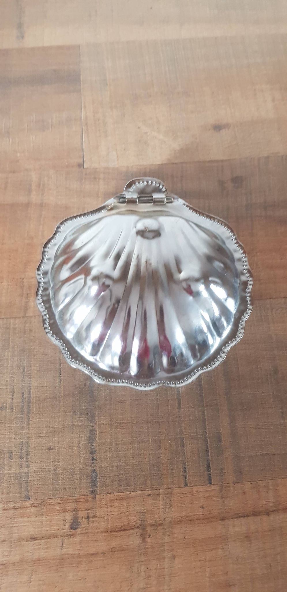 Vintage ashtray in silver metal and a blue glass part that goes inside in the shape of a saint jacques shell