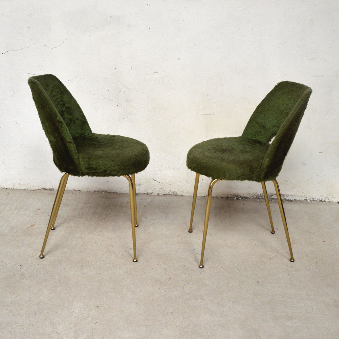 Pair of green Pelfran chairs