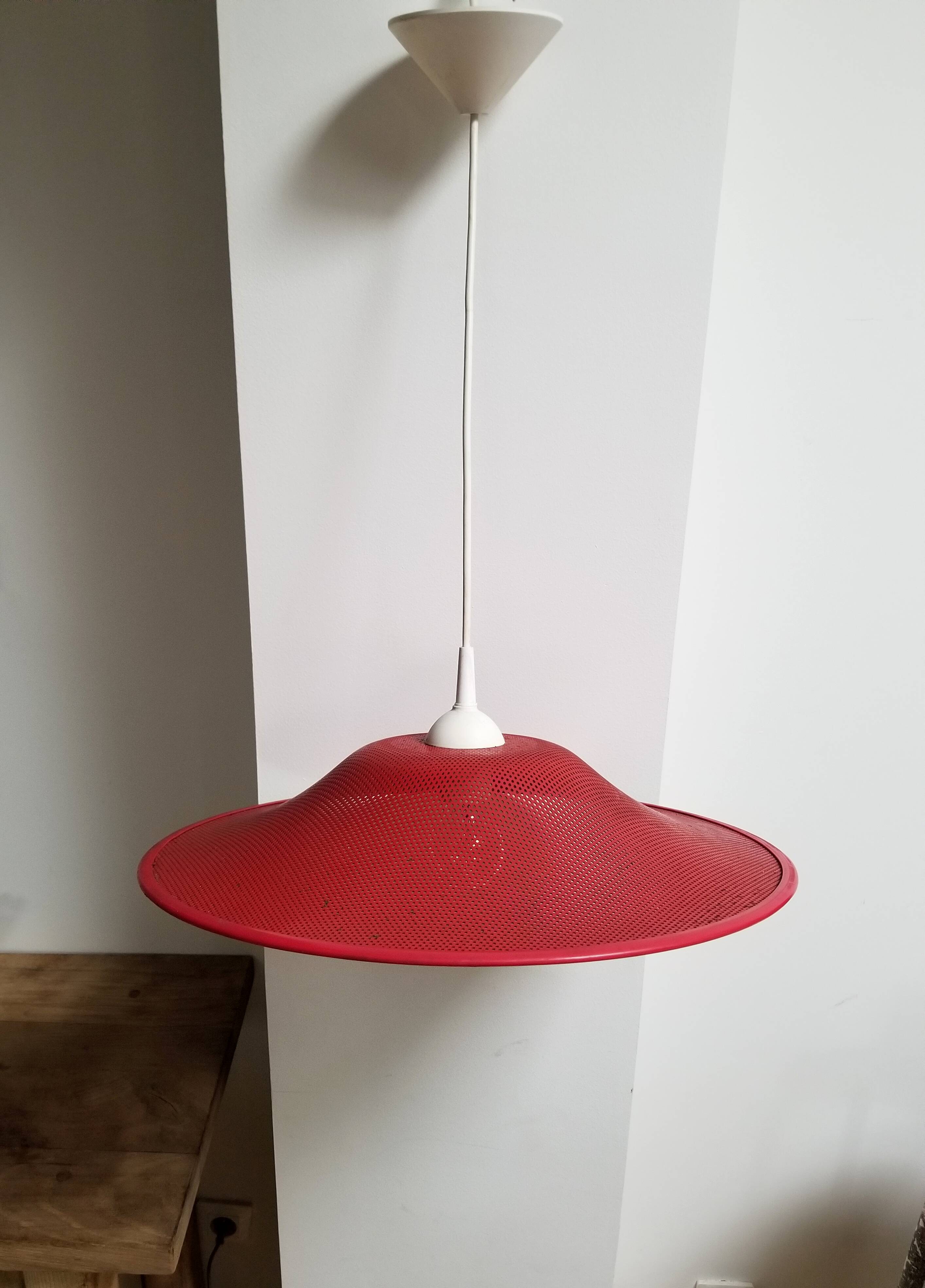 Red perforated hanging