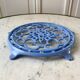 Cast iron coaster painted sky blue early twentieth century