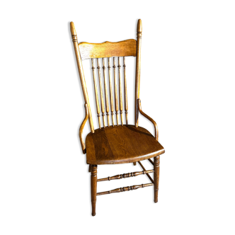 Wooden armchair with high back