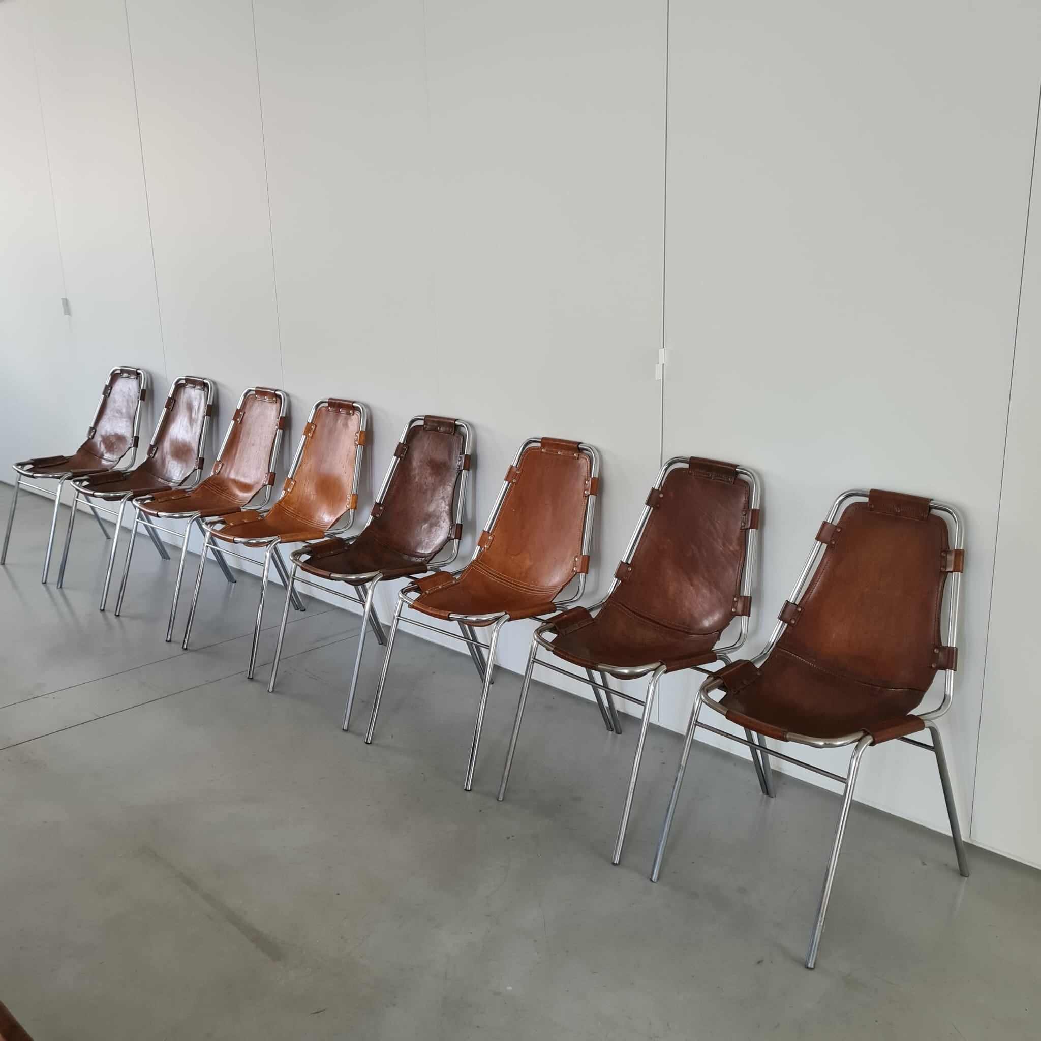 Set of eight mid-century leather dining chairs