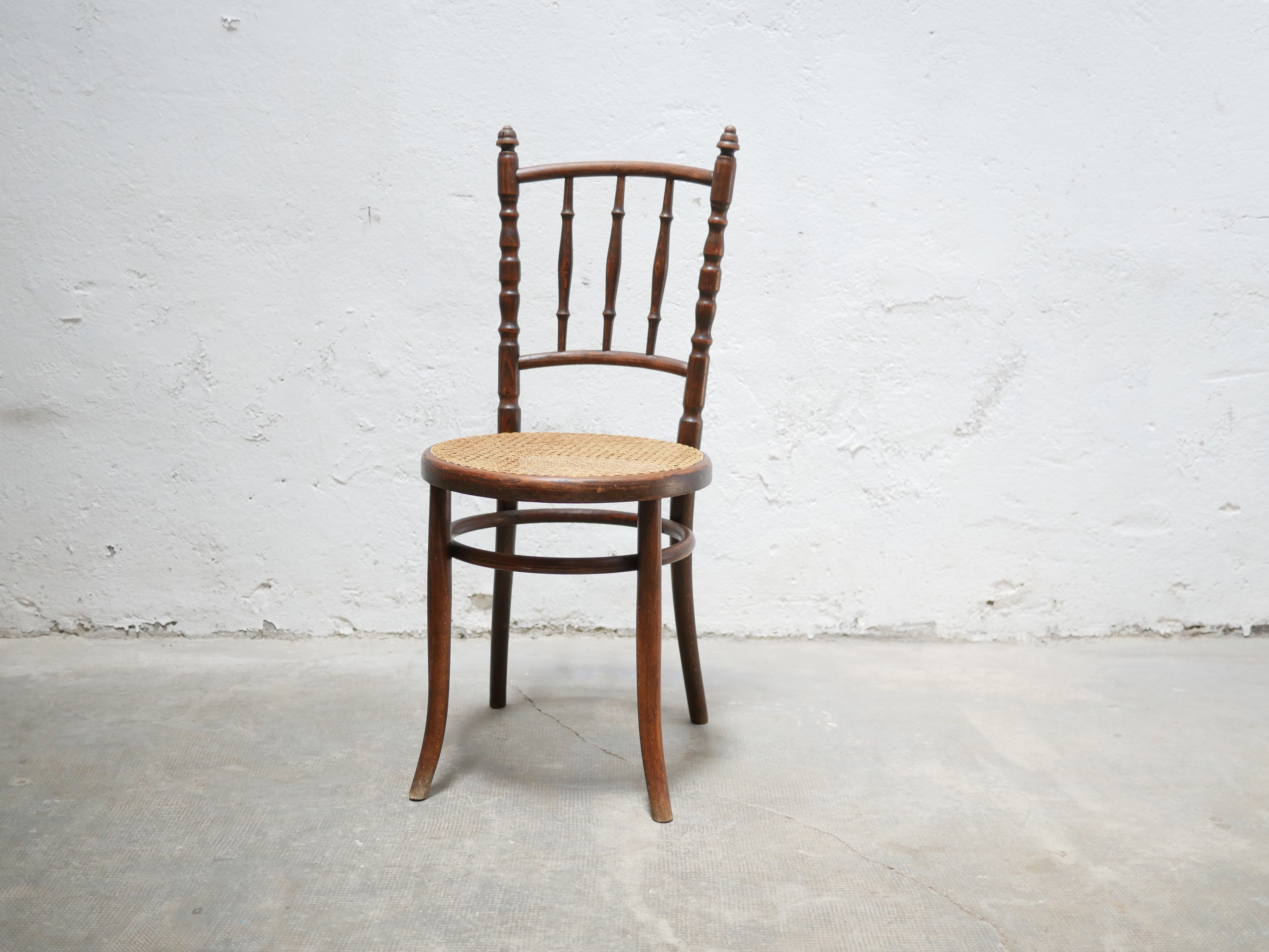 Old wooden cane bistro chair by Fischel editions
