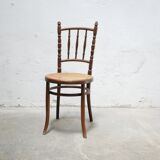 Chaise bistrot cannée ancienne en bois par les éditions Fischel
