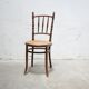 Old wooden cane bistro chair by Fischel editions
