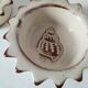 Duo of handmade beige and terracotta earthenware empty pockets