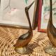 Duo of golden brass swans