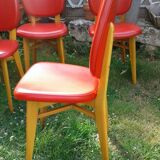Set of 6 chairs in wood covered with red skai