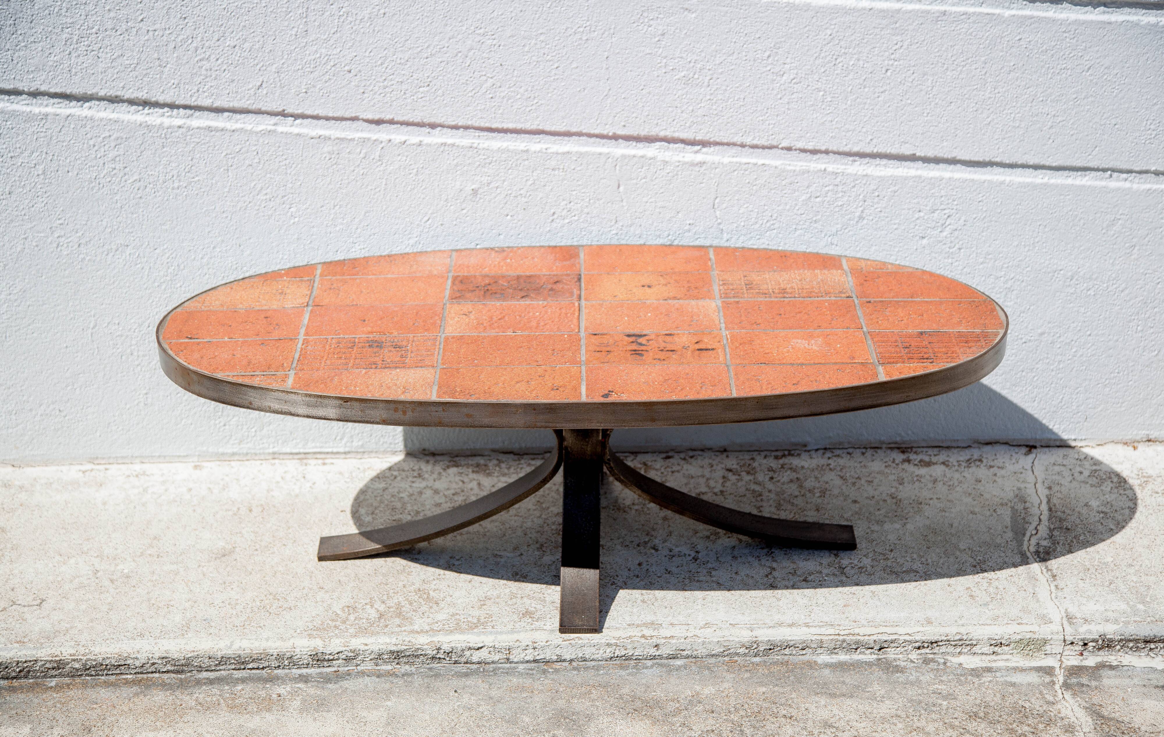 Jean Jaffeux coffee table, glazed lava stone table with wrought iron structure, 60's