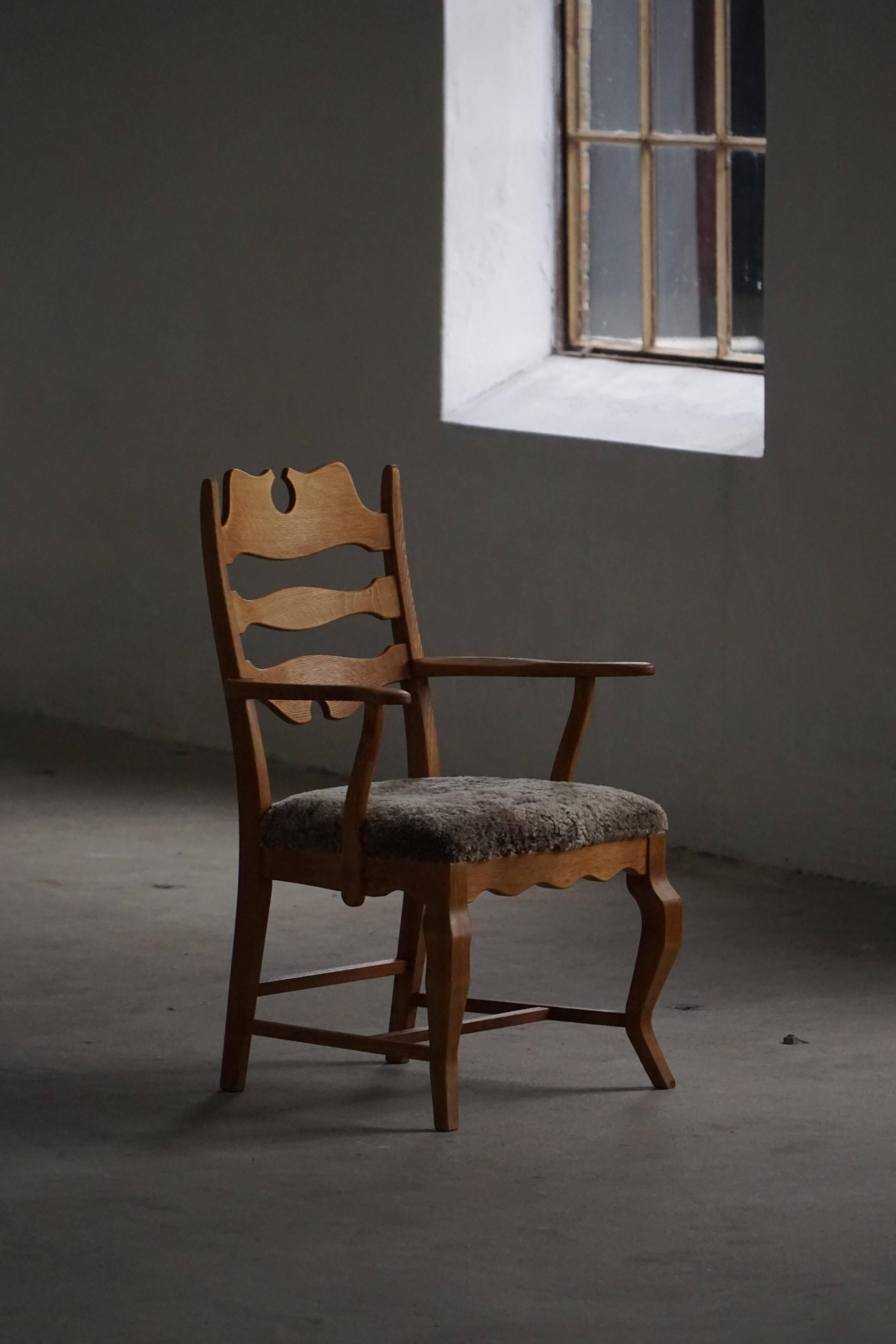 Razorblade armchair from the mid-20th century by Henning Kjærnulf, oak and lambswool, 1960.