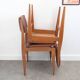 Pair of chairs in wood and brown skaï