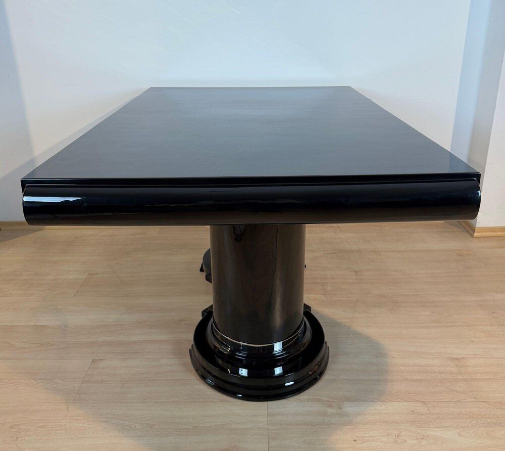 Art Deco dining table in black piano lacquer & metal, 1930