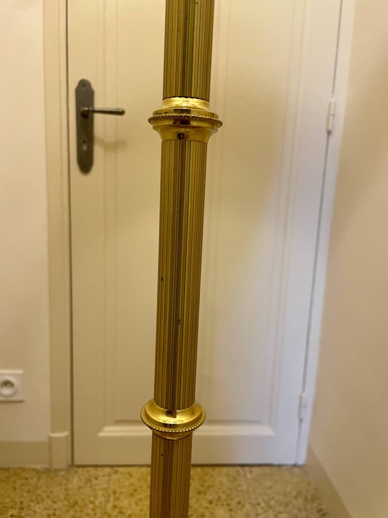 Bronze floor lamp by Lucien Gau, with a six-light shade model 16136.