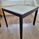 Italian metal table with frosted glass top, extendable.