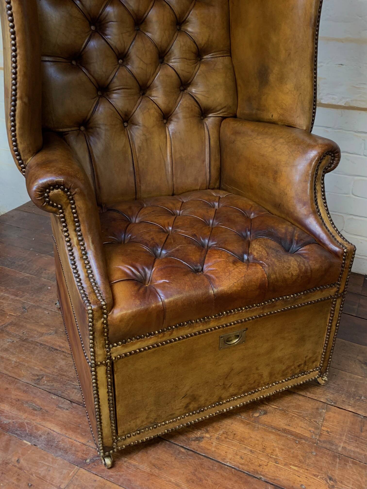 A Rare & Exceptional Deep-Buttoned Chesterfield Porter’s Chair Circa 1920’s