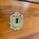 Restoration period walnut chest of drawers with a scroll handle