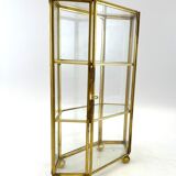 Glass and brass jewelry showcase