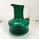Pichet en verre soufflé vert vintage