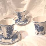 Three cups and two saucers made of Gzhel porcelain.