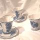 Three cups and two saucers made of Gzhel porcelain.