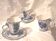 Three cups and two saucers made of Gzhel porcelain.