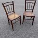 Pair of canned bistro chairs