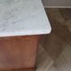 Louis Philippe style chest of drawers with 4 drawers in solid walnut and marble, 1900-1950.