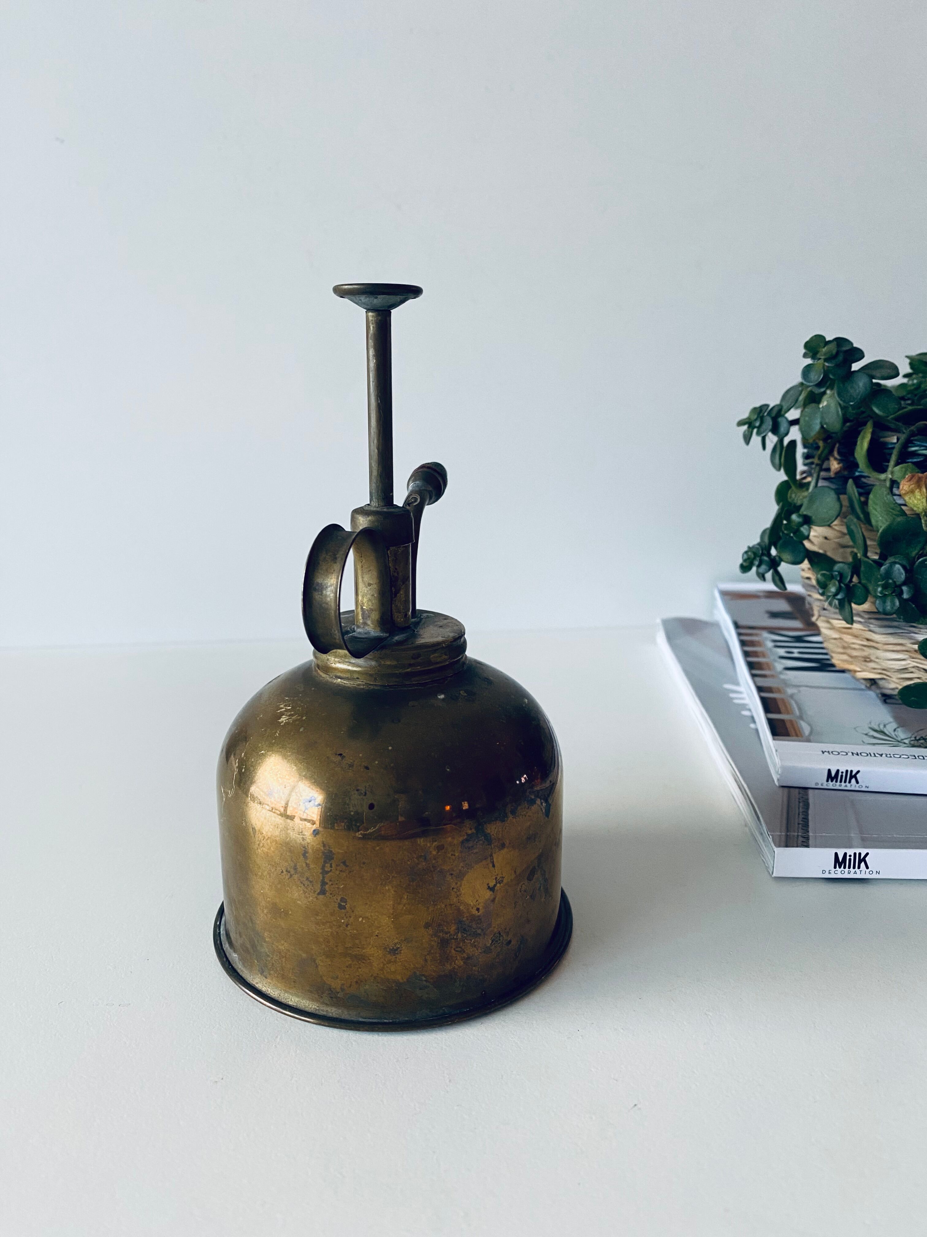Old brass mist for indoor plants