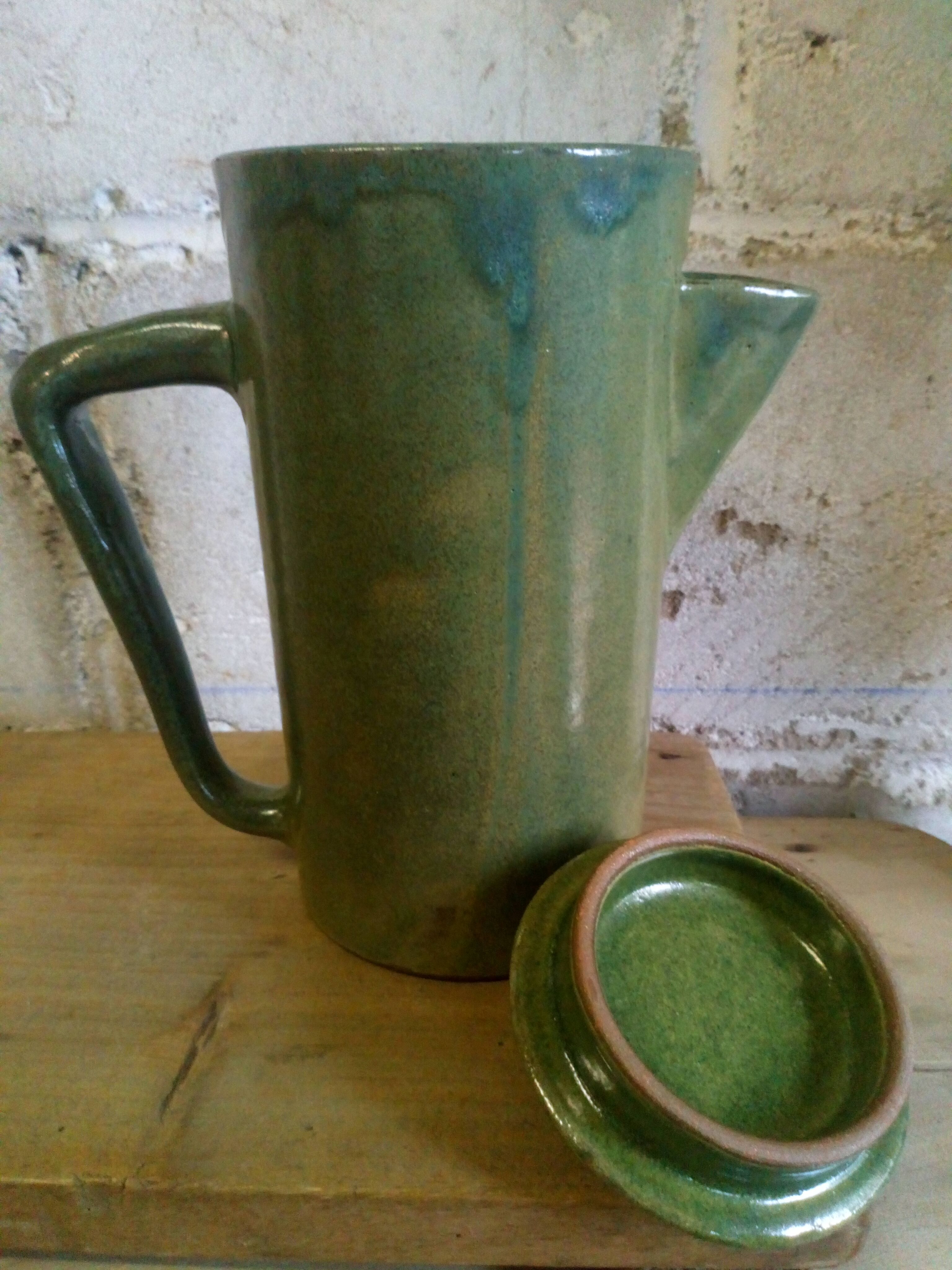 Green emailed sandstone teapot
