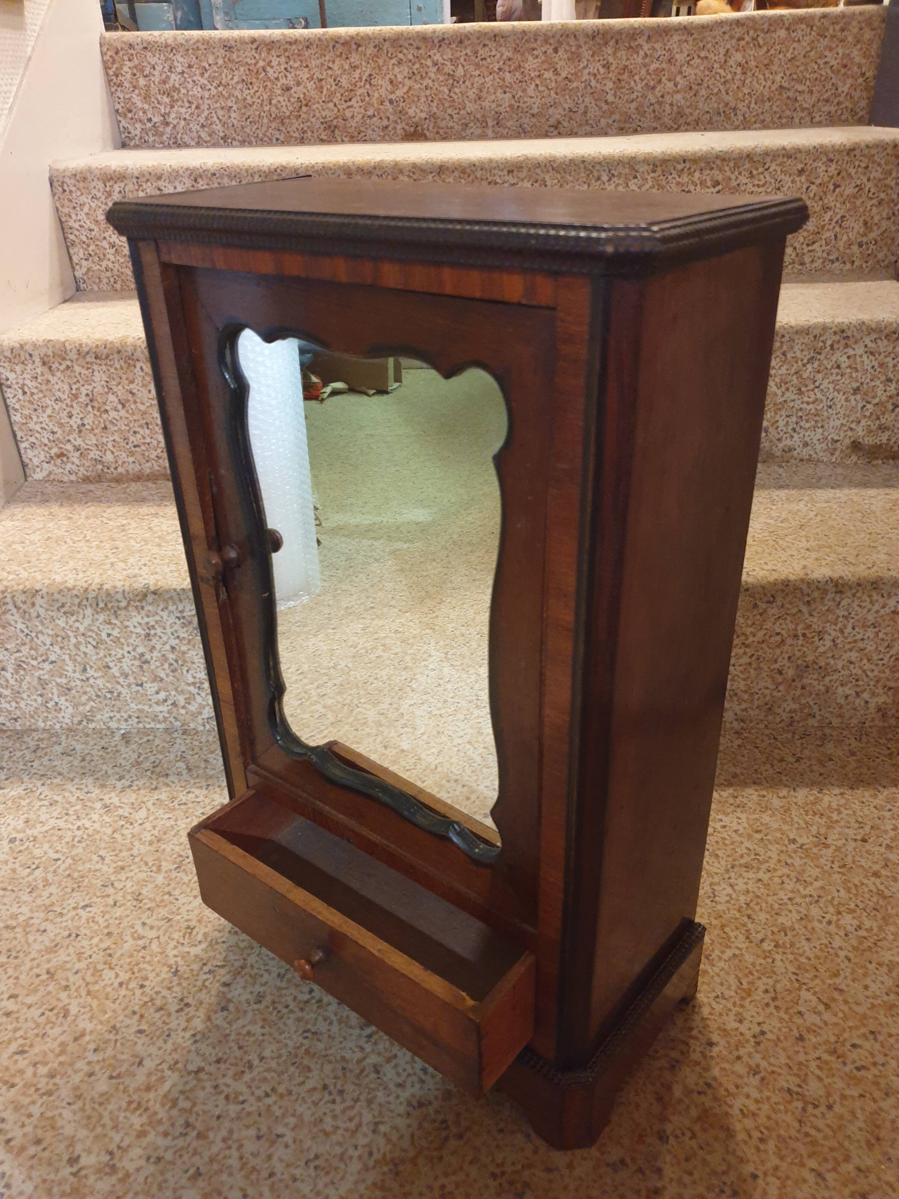 Antique doll cabinet