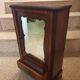 Antique doll cabinet