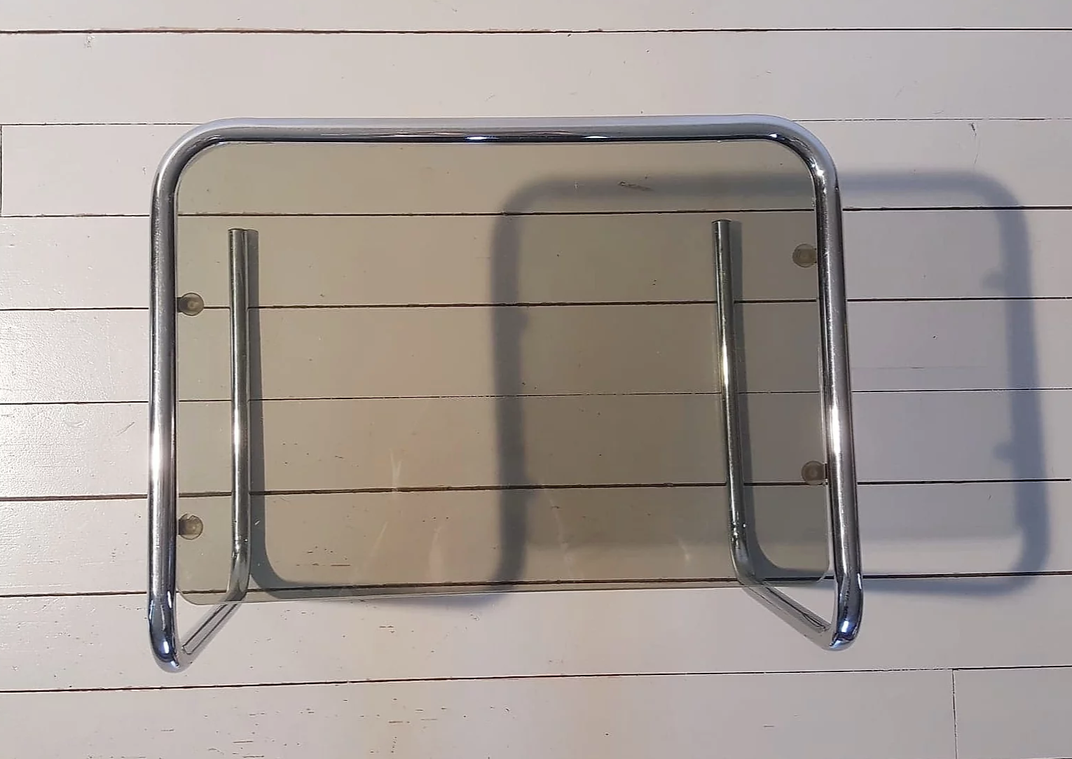 Smoked glass and chrome metal sofa tip