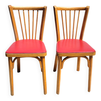 Pair of red Baumann bistro chairs