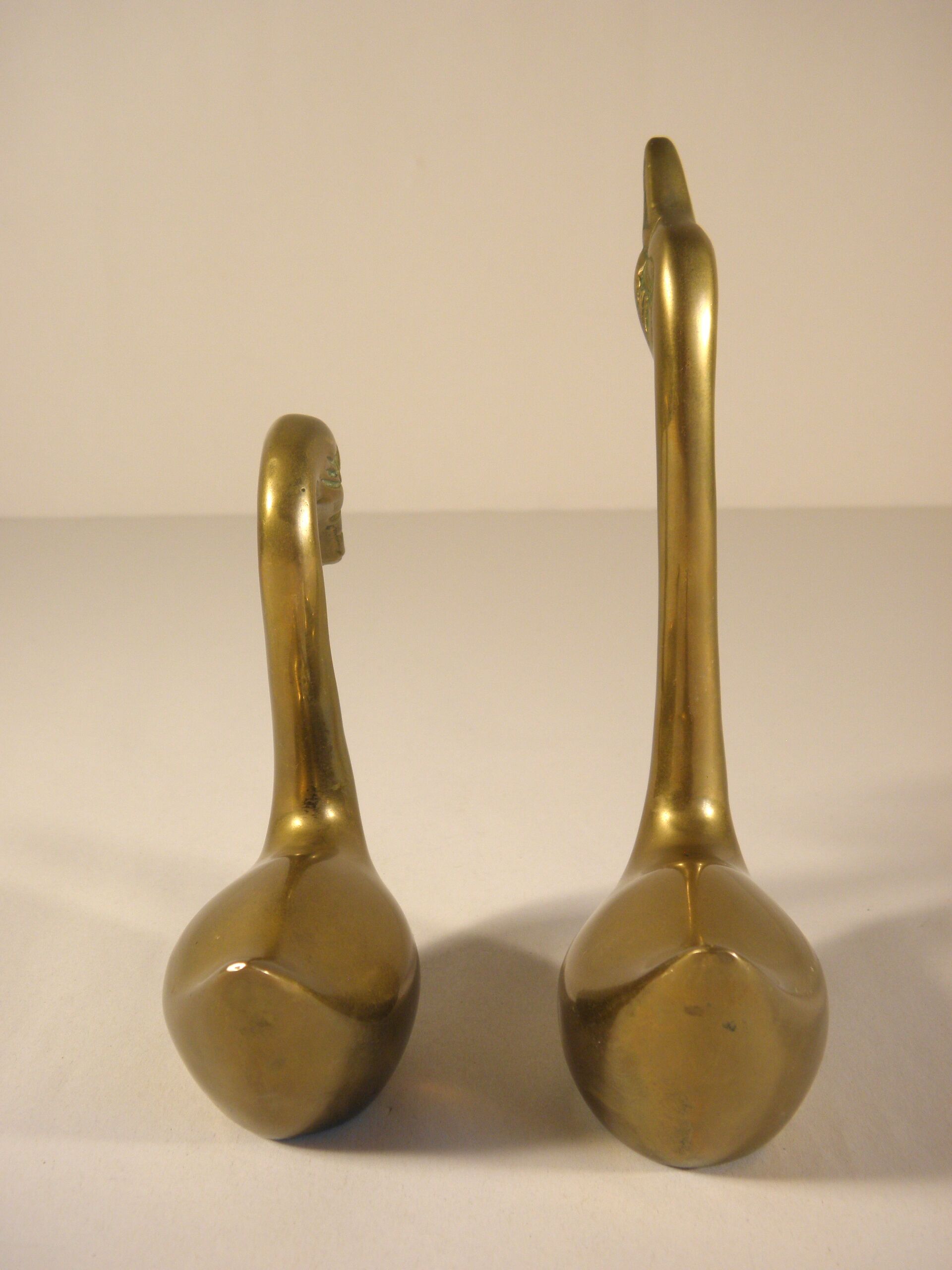 Pair of brass swans