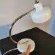 Curved lamp, brass and lacquered steel, 1960, France