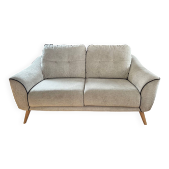 Grey two-seater sofa