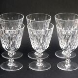Suite of 6 Baccarat crystal water glasses with honeycomb patterns.