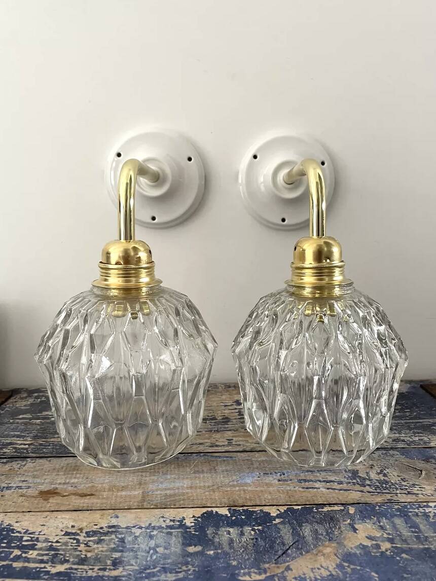 Pair of chiseled glass wall sconces